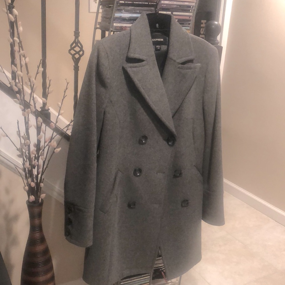 In like new condition  Gray Wool coat size 1/2
